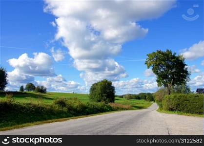 Landscape with road and the cloudy sky