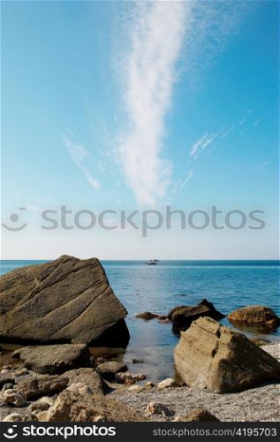 Landscape with rocks and cloud.