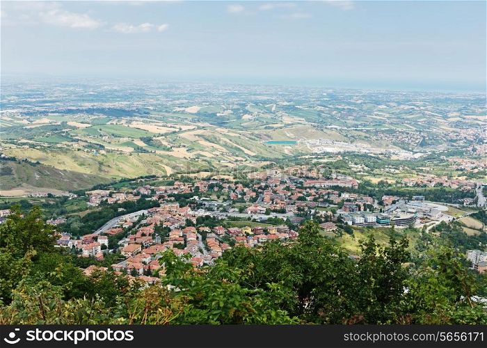 landscape with roofs of houses in small tuscan town in province, Italy