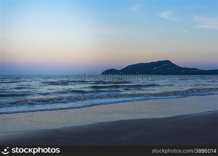landscape with sea and mountain at sand beach