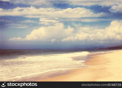 Landscape with sea, mountains and sky with clouds. HDR