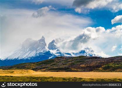 Landscape with snow capped Cuernos Del Paine mountain at Torres del Paine National Park in Southern Chilean Patagonia, Chile