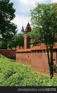 Landscape with towers and ramparts of the castle Malbrok. Poland