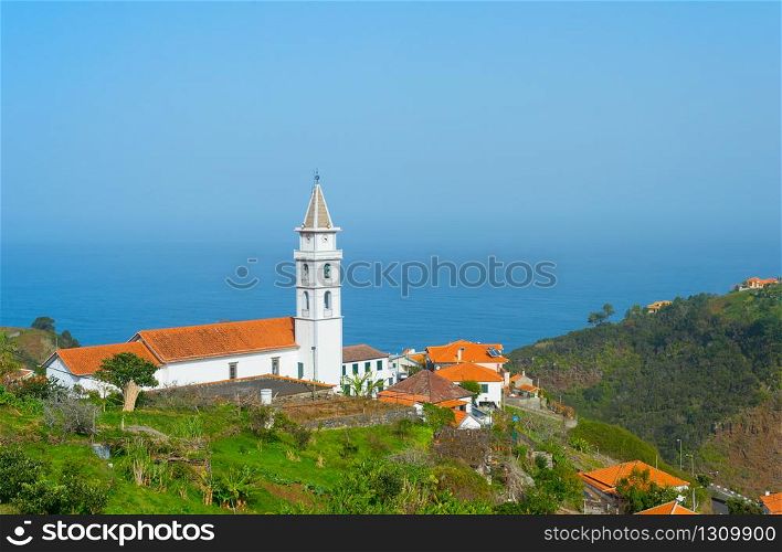 Landscape with village, church and ocean. Madeira island, Portugal