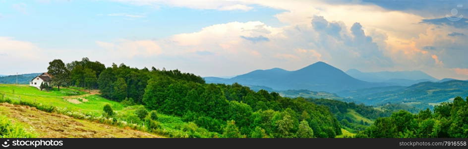 Landscape with white home, mountains and trees. Bosnia and Herzegovina