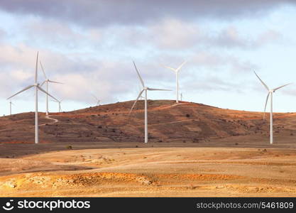 Landscape with wind park and many high windmills