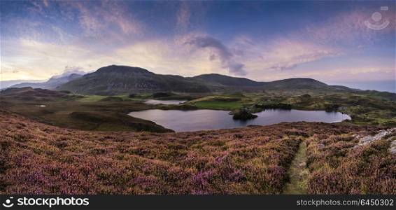 Landscapes. Stunning sunrise landscape over Cregennen Lakes with Cadair Idris in background in Snowdonia