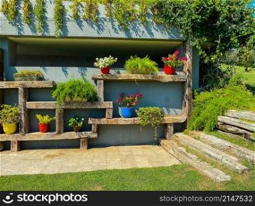 Landscaping on a garden wall, Pots and flowers