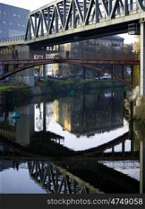 Landwehrkanal-Berlin. Reflection of a pedestrian bridge over the Landwehr Canal in Berlin, Germany