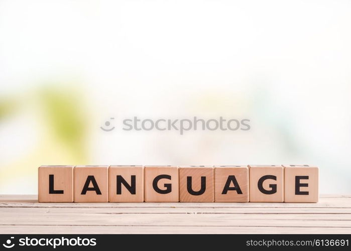 Language lesson sign made of cubes on a table