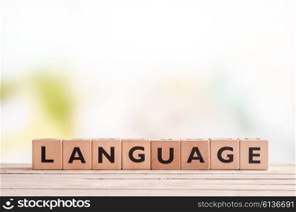 Language lesson sign made of cubes on a table