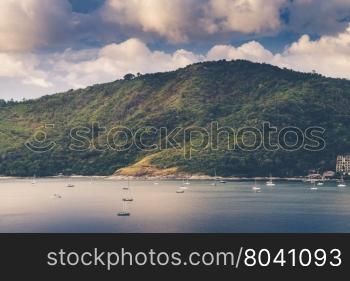 Lanscape of Andaman sea with sailing boat (Vintage filter effect used)