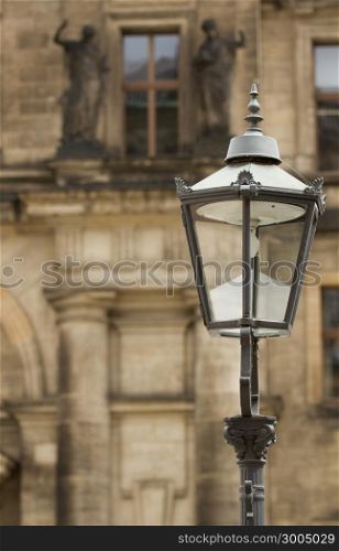Lantern and a historical building in Dresden ,Germany.