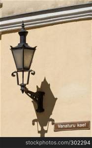 Lantern with shadow on the wall in Tallinn, Estonia