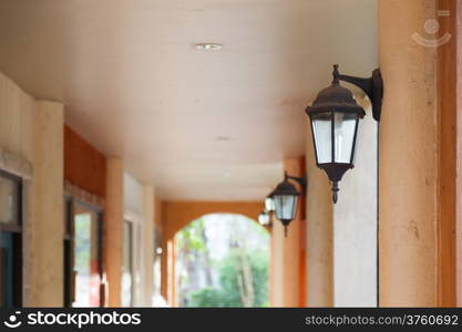 Lanterns on poles cascaded forward. Inside the home