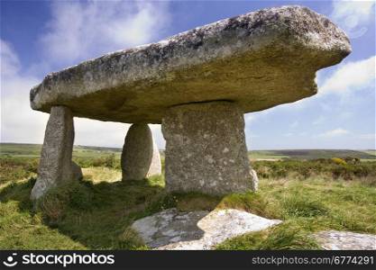 Lanyon Quoit Prehistoric Stones in Cornwall in the United Kingdom. The stones of this ancient grave site were originally at the centre of a huge burial mound 90ft x 40ft. They were erected in circa 2500BC.