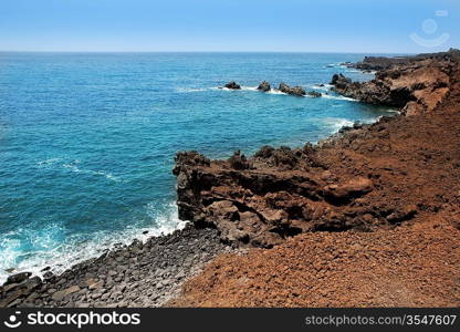 Lanzarote Punta del volcan Atlantic sea in canary Islands