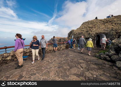 Lanzarote, Spain - February 12,2018: Tourist visiting Mirador del rio famous touristic attraction in Lanzarote, Canary islands, Spain.