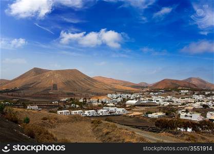 Lanzarote Yaiza white houses village under volcanic mountains of Canary Islands