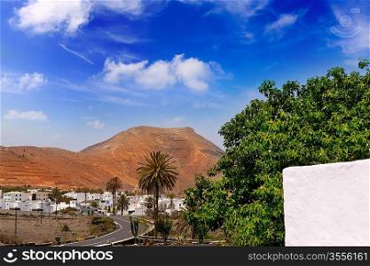 Lanzarote Yaiza white houses village under volcanic mountains of Canary Islands