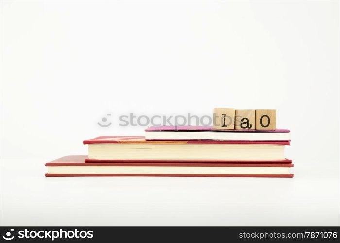 lao word on wood stamps stack on books, language and study concept