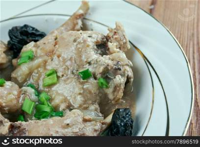 Lapin la tournaisienne - rabbit in a dark sauce. Belgian cuisine