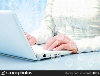 Laptop and business person against technology background