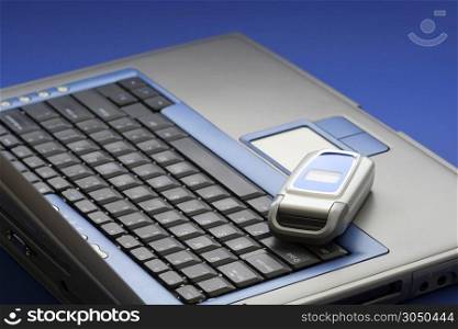 Laptop and cellphone, business communication concept