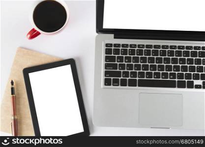 laptop computer, tablet and notebook on white background - top view