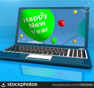 Laptop Computer With Happy New Year Message. Laptop Computer Showing Happy New Year Message