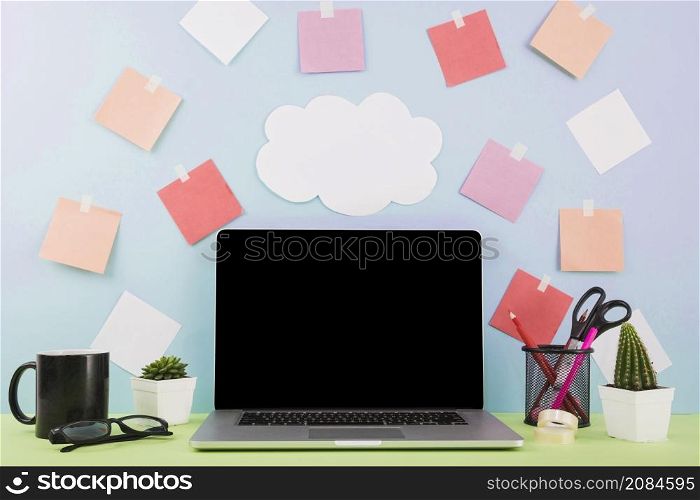 laptop front wall with cloud paper adhesive notes