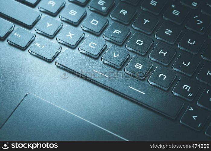 Laptop keyboard and touchpad: closeup picture