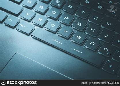 Laptop keyboard and touchpad: closeup picture