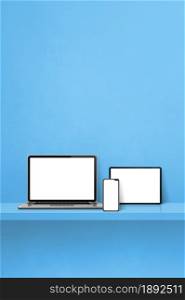 Laptop, mobile phone and digital tablet pc on blue wall shelf. Vertical background. 3D Illustration. Laptop, mobile phone and digital tablet pc on blue wall shelf. Vertical background