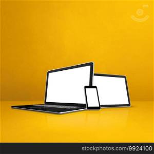 Laptop, mobile phone and digital tablet pc on yellow office desk. 3D Illustration. Laptop, mobile phone and digital tablet pc on yellow office desk