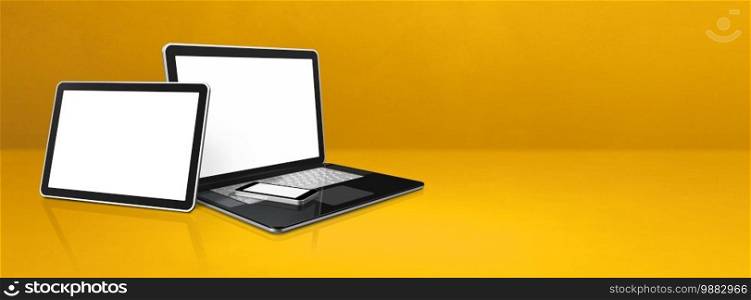 Laptop, mobile phone and digital tablet pc on yellow office desk. Banner background. 3D Illustration. Laptop, mobile phone and digital tablet pc on yellow office desk. Banner background
