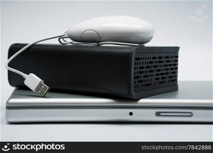 laptop, mouse and an external hard drive