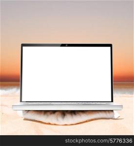 laptop on beach at sunrise ready for remote work or freelance. remote work