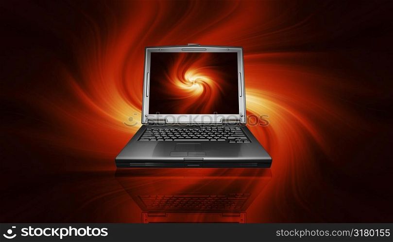 Laptop on fiery background