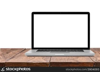 Laptop with blank screen on wooden empty brown table isolated on white background. Laptop with blank screen on wooden table isolated