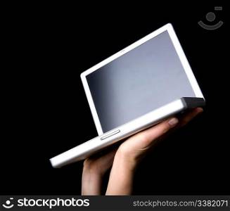 Laptop with blank screen - presented with a pair of hands