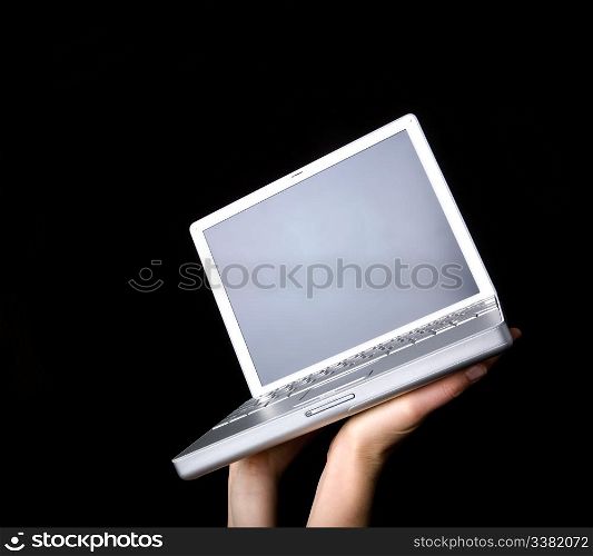 Laptop with blank screen - presented with a pair of hands