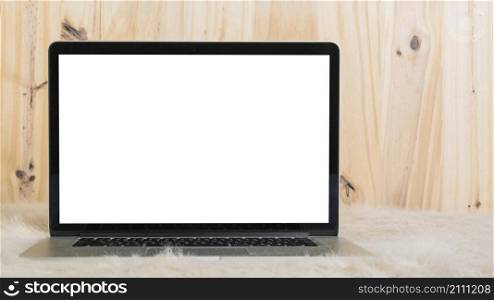 laptop with blank white screen soft fur