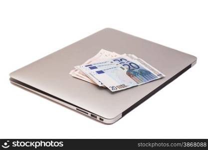Laptop With Dollars And Euro money
