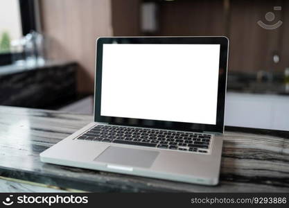 Laptop with Mock up blank screen on table in front of cafe space for text. product display computer laptop montage- technology concept.