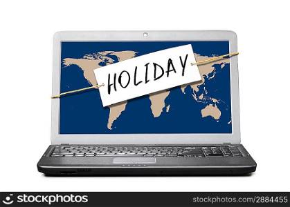 laptop with note about holiday isolated on white