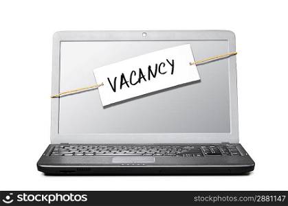 laptop with note about vacancy