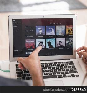 laptop with spotify app