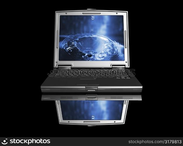 Laptop with water drop