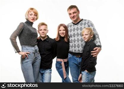 Large adult Russian family in casual clothes, isolated on white background a. Large adult Russian family in casual clothes, isolated on white background